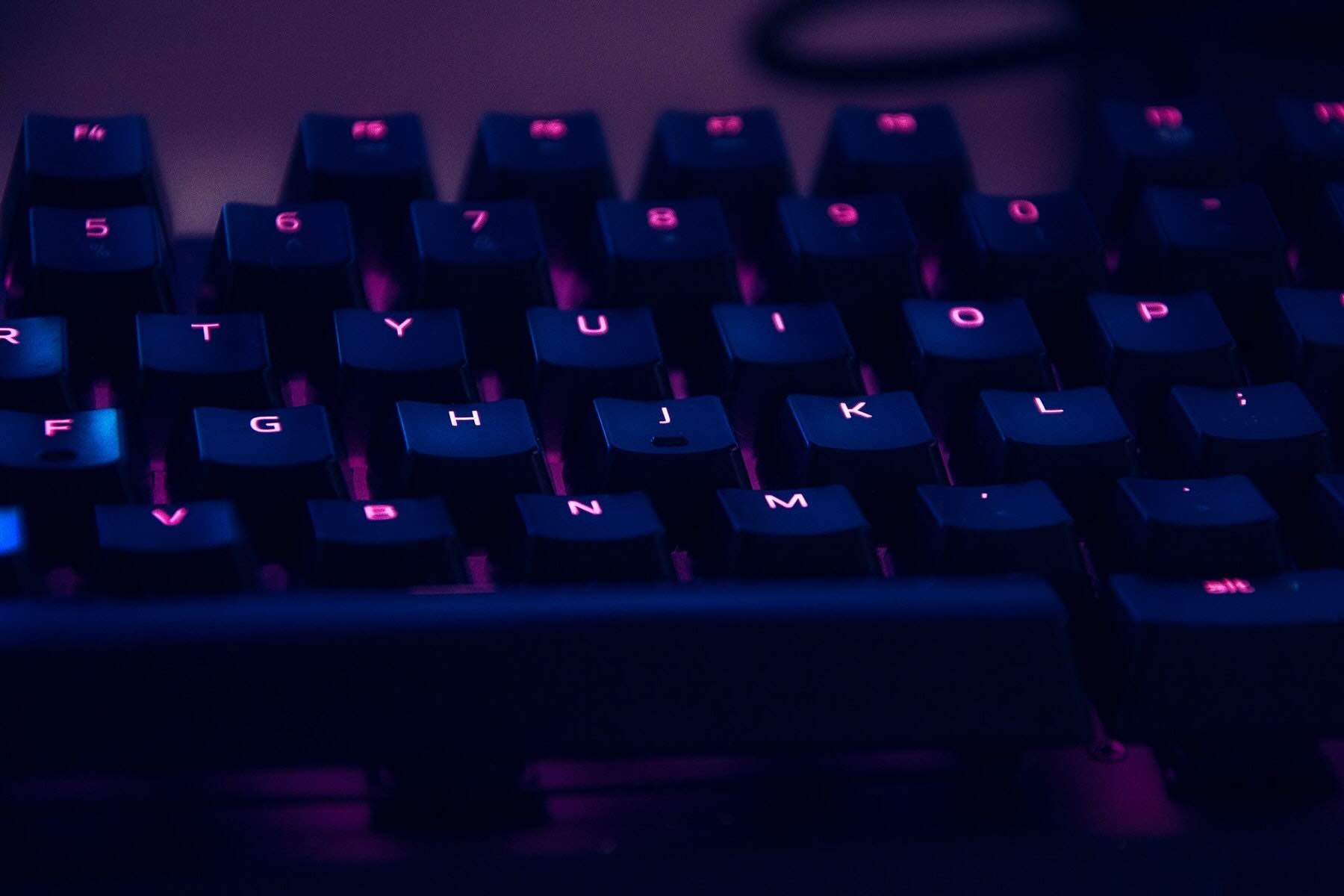 Purple luminescent mechanical keyboard.